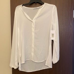 White long sleeve top